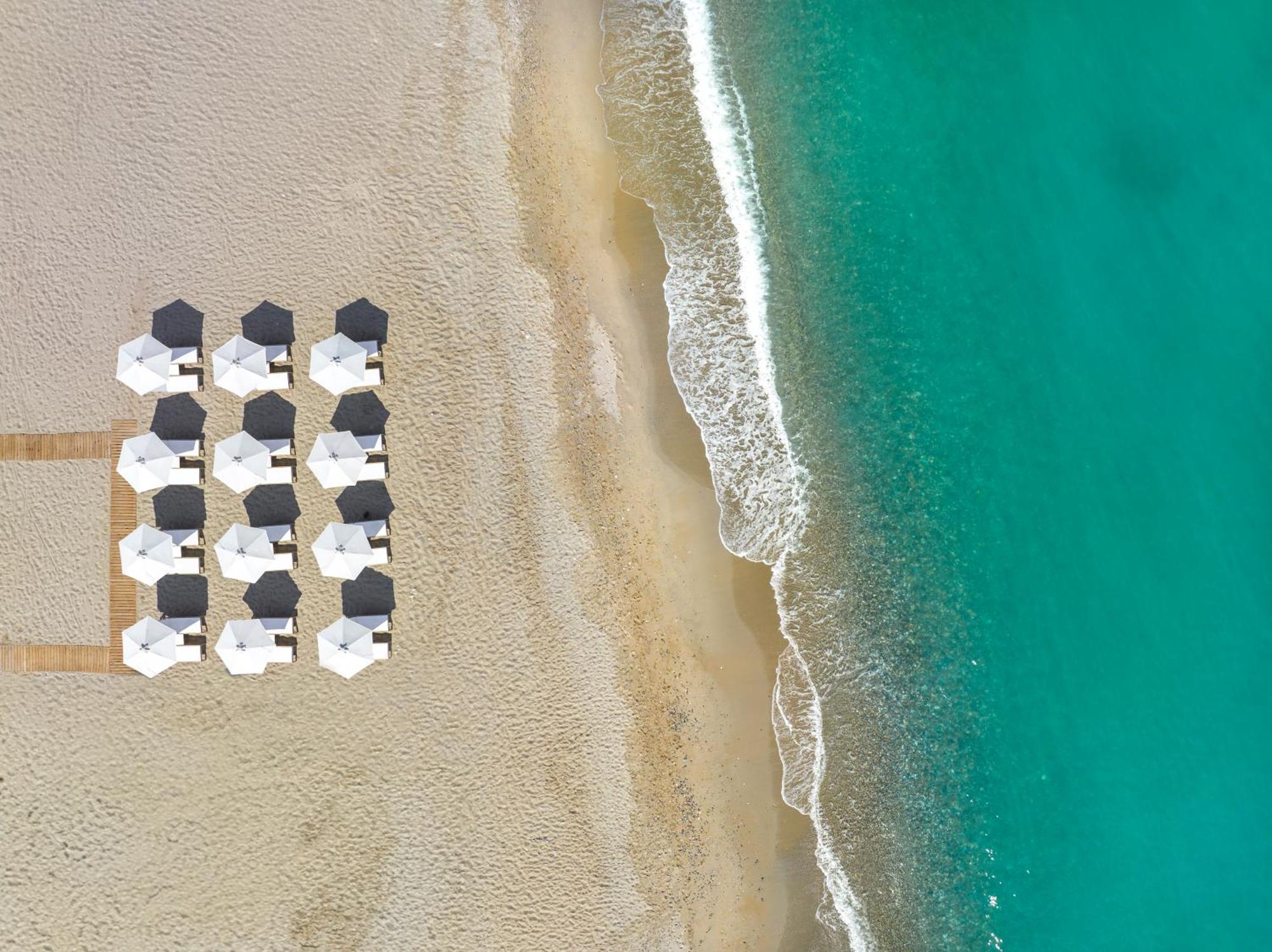 Calla Luxury Seafront Suites Resmo Dış mekan fotoğraf