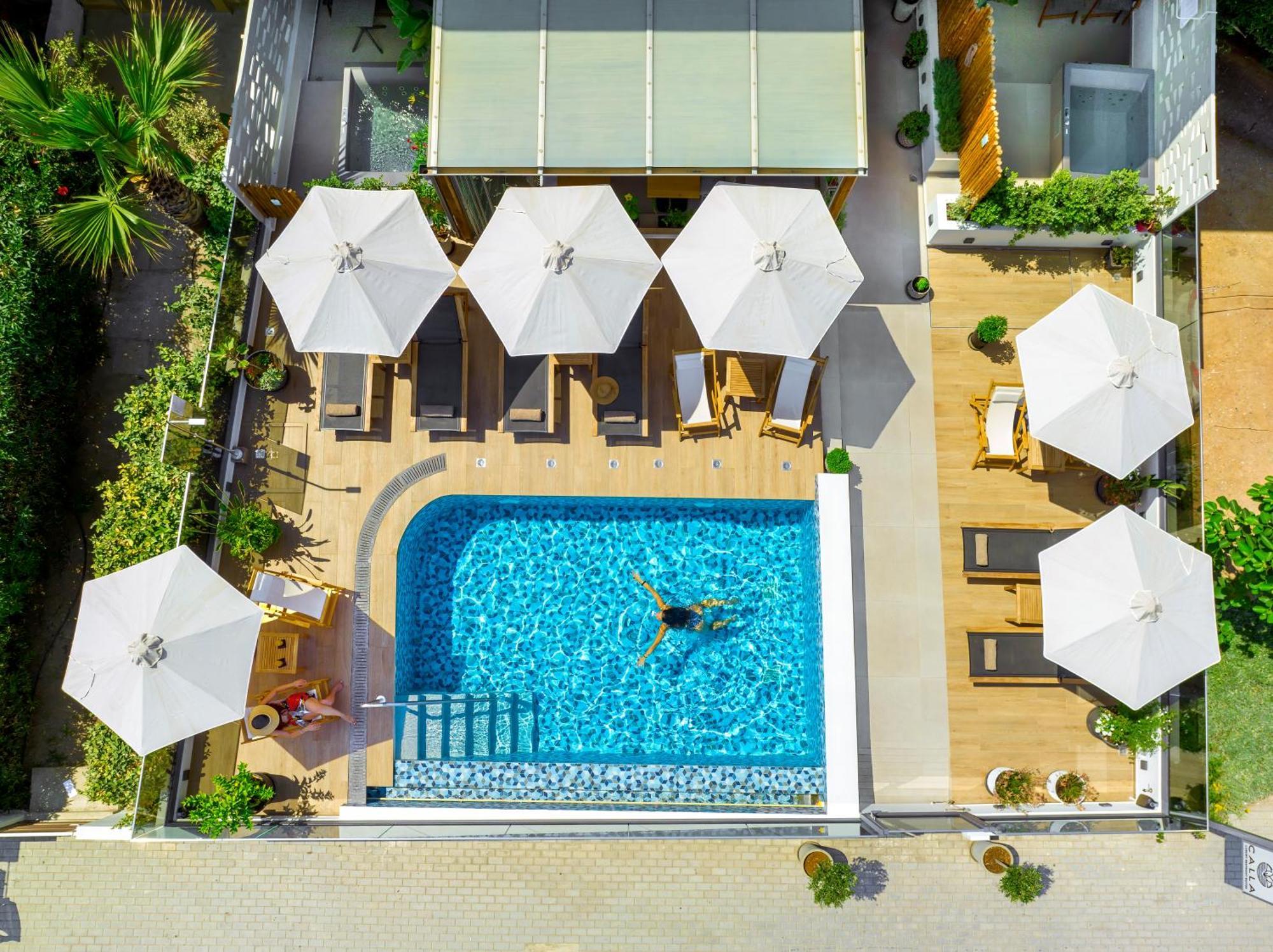 Calla Luxury Seafront Suites Resmo Dış mekan fotoğraf